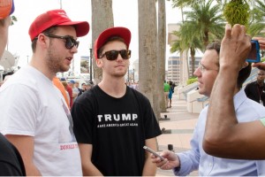 Ivelliam Ceballo | USFSP “I couldn’t see myself doing journalism anywhere else,” says Marrero (in blue shirt), shown interviewing Trump supporters from Melbourne.