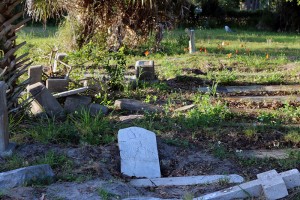 Caitlin Ashworth | USFSP In some parts of the historic cemetery, headstones are piled in disarray.