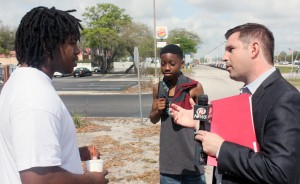 Jeffrey Zanker | USFSP Zimmer chats with diners Boteem Williams (left) and his brother Brindon outside the restaurant. 
